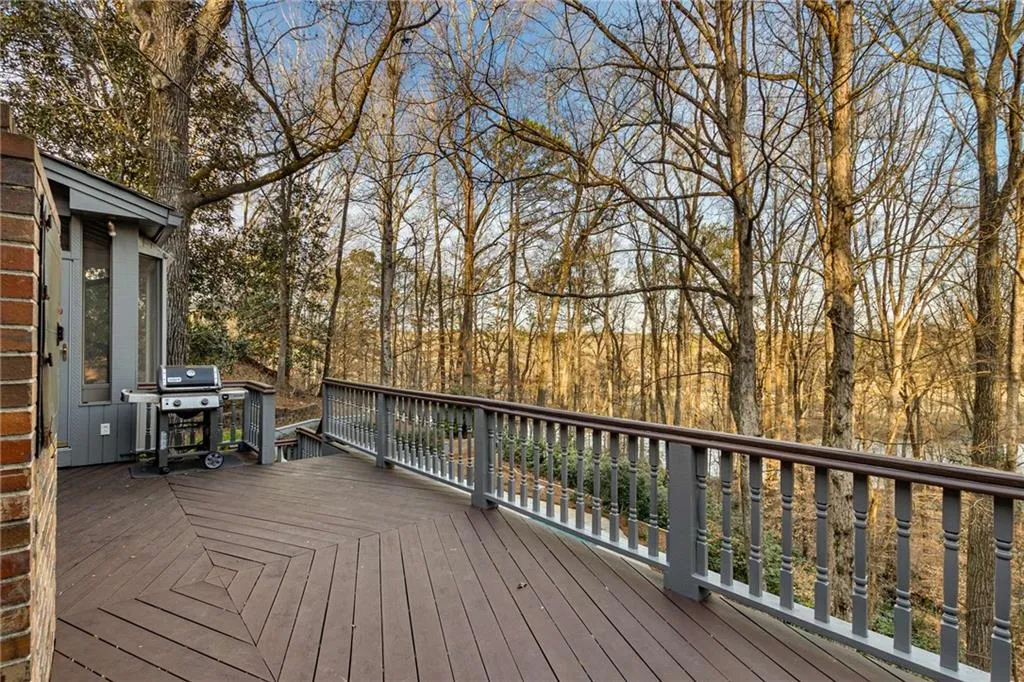 Deck overlooking pool and river.