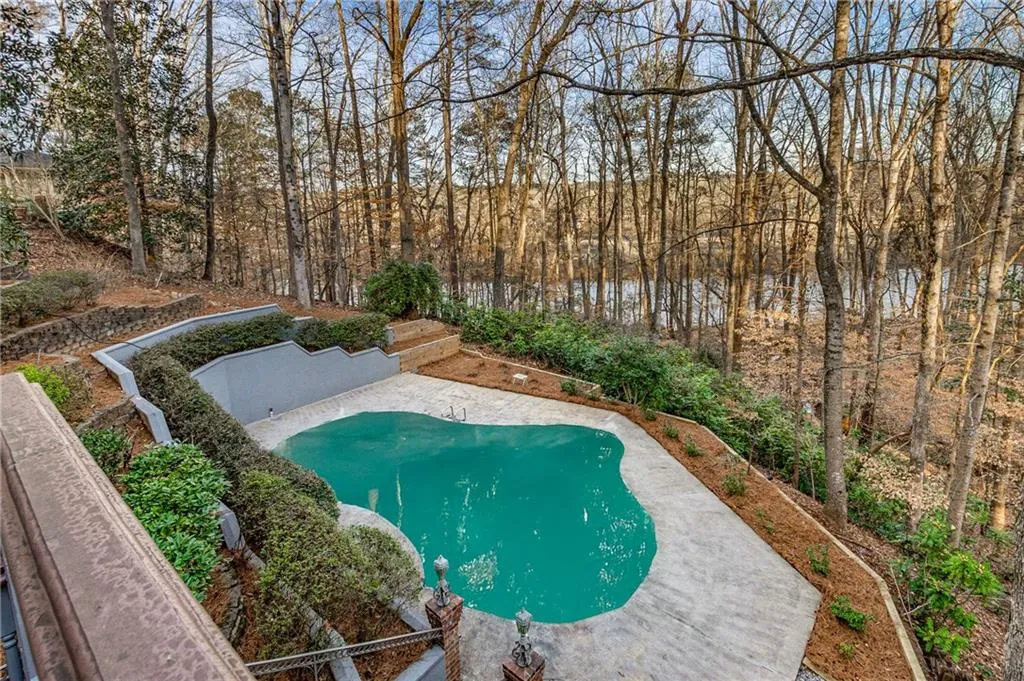 Outdoor pool in quiet setting.