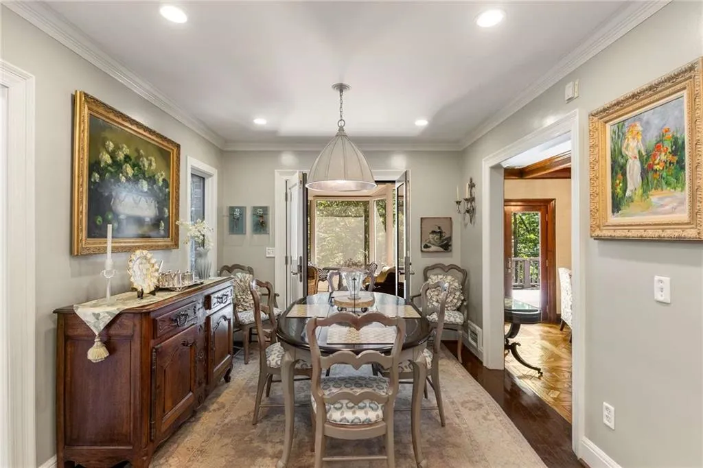 Eat-in kitchen has view to family room and screened porch.
