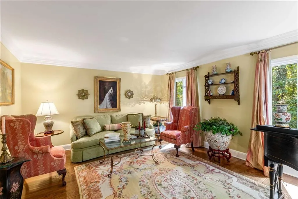 Located off the foyer and facing the front of the home, this lovely room boosts lots of natural light.