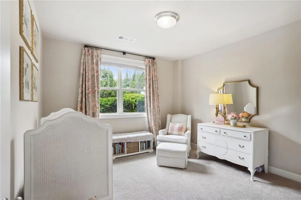 Third bedroom on the terrace level with (2) large walk-in closets and private bath and 10' ceilings and full sun