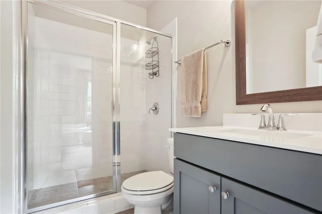 Private terrace level bedroom with large glassed shower