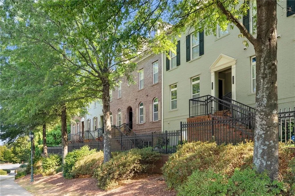 View of front of home featuring brick siding