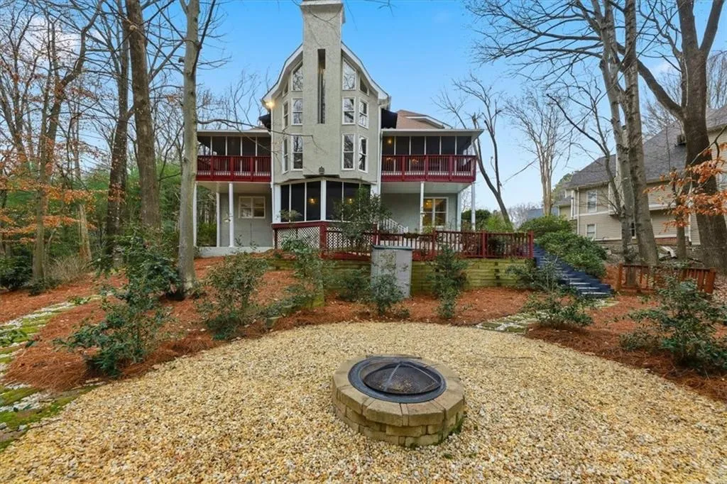 Rear view of property featuring a balcony