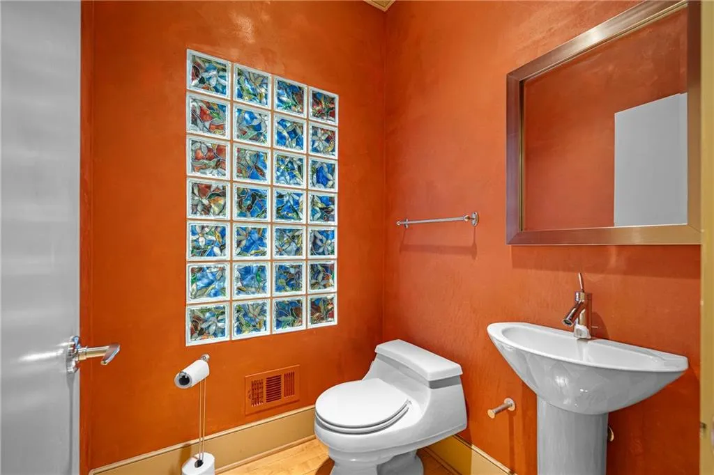 Half bathroom featuring toilet