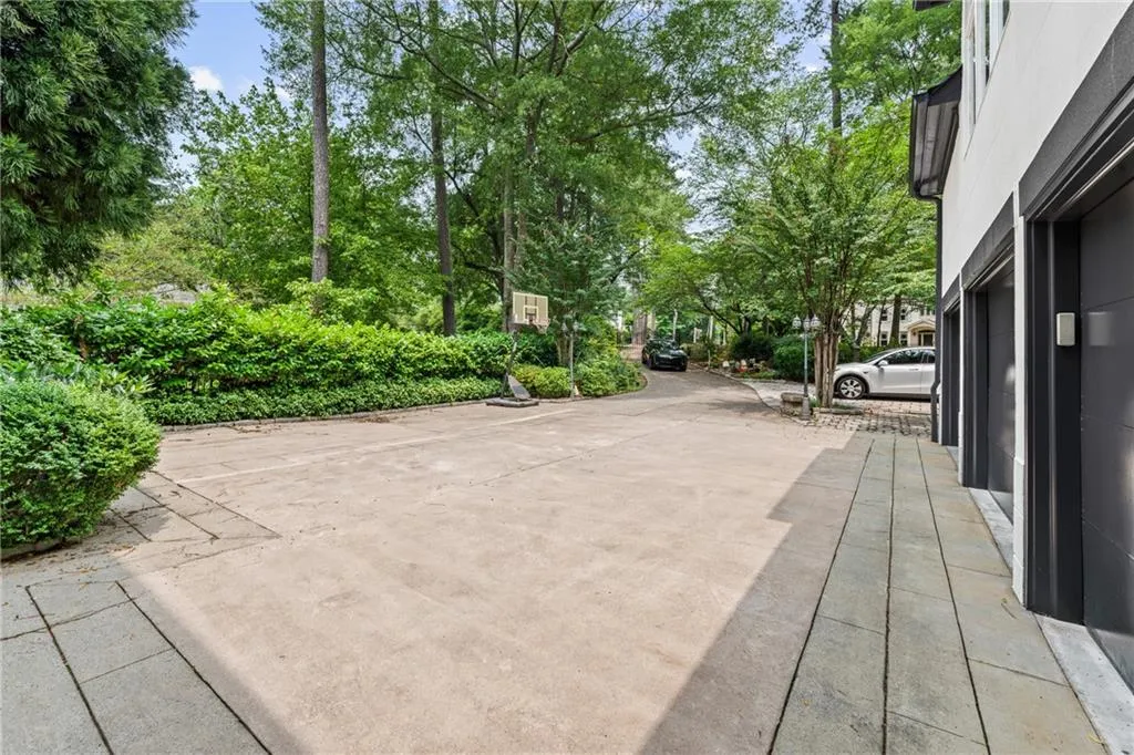 View of patio / terrace featuring view of scattered trees