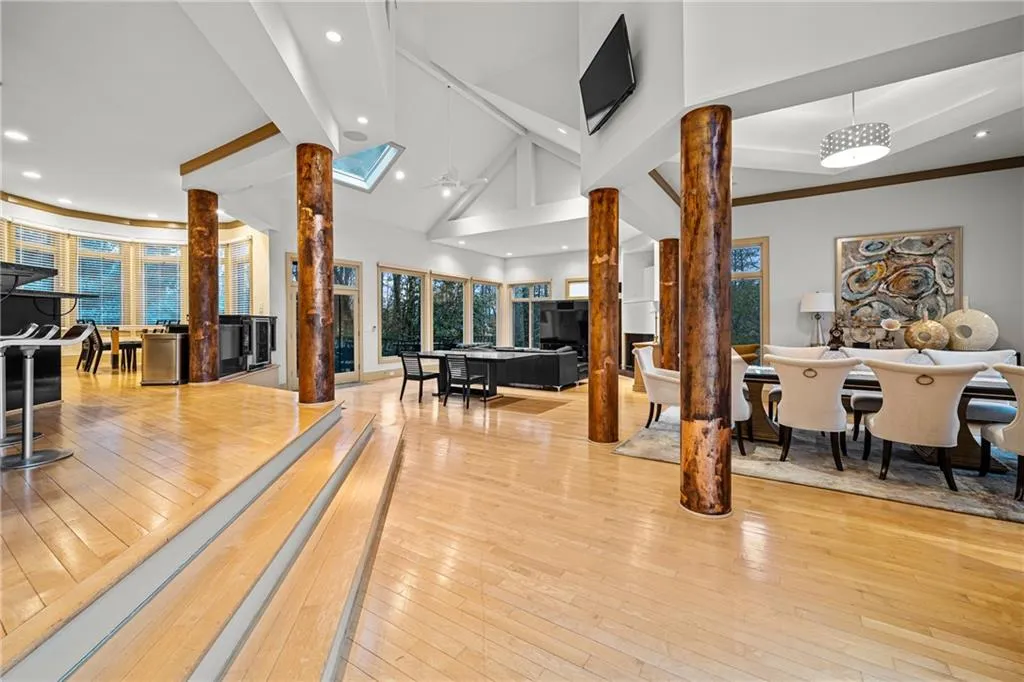 Community lobby with high vaulted ceiling and recessed lighting