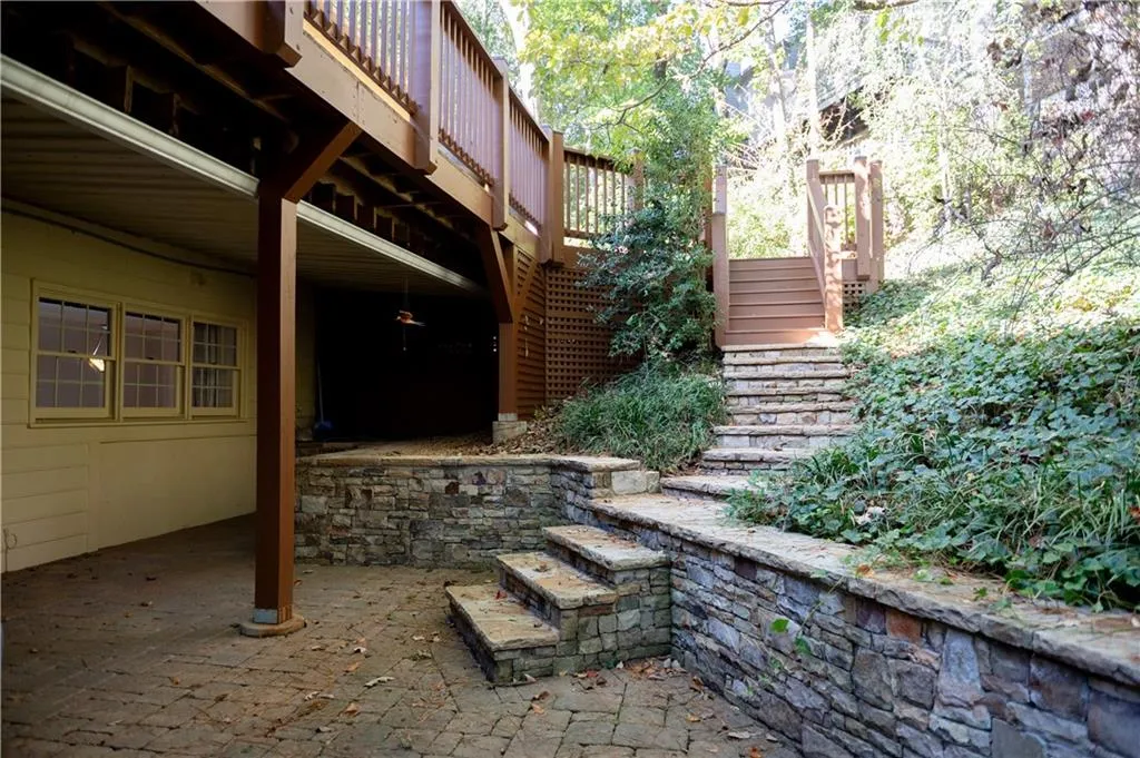 Terrace level patio provides additional outdoor entertainments space connecting the large deck and the lower level recreation area.