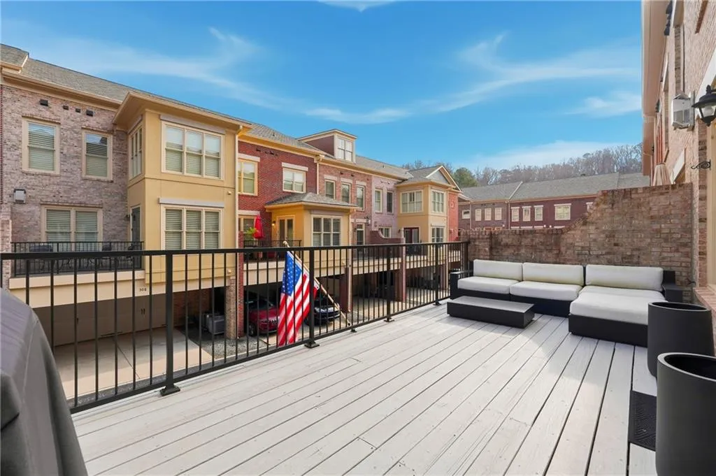 Wooden deck with a residential view and an outdoor hangout area