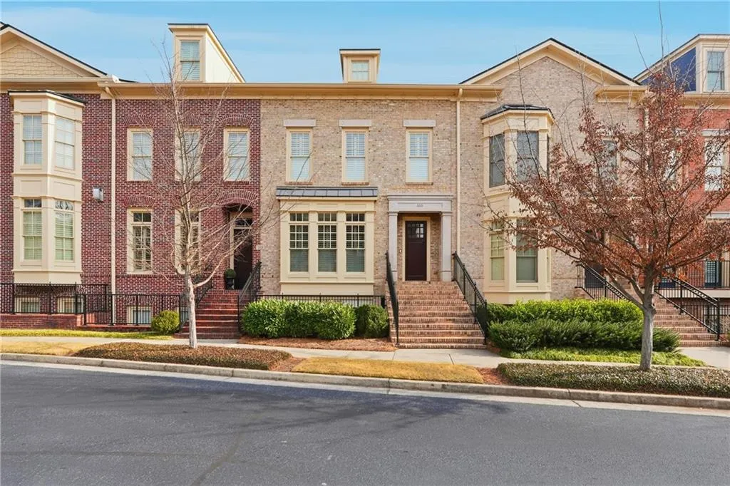 View of front of property featuring brick siding