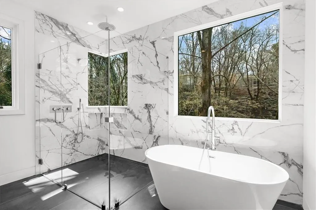 Master ensuite bathroom with shower, soaking tub and walk-in closet