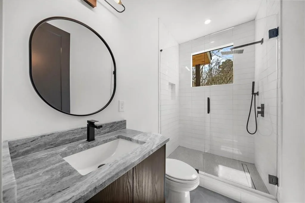 Upper floor guest bathroom 1