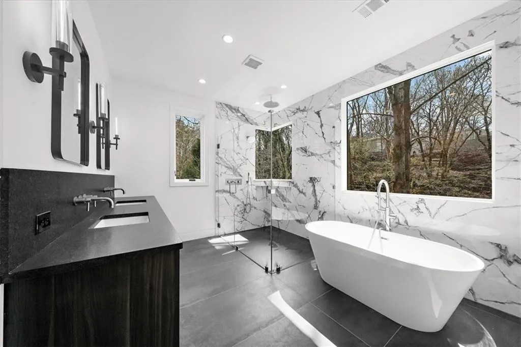 Master ensuite bathroom with shower, soaking tub and walk-in closet