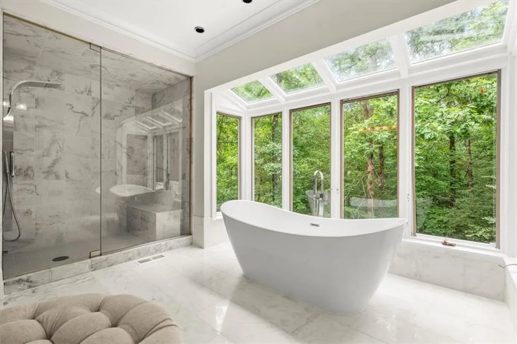 Bathroom with tile floors, ornamental molding, and plus walk in shower Bathroom with tile floors, ornamental molding, and plus walk in shower