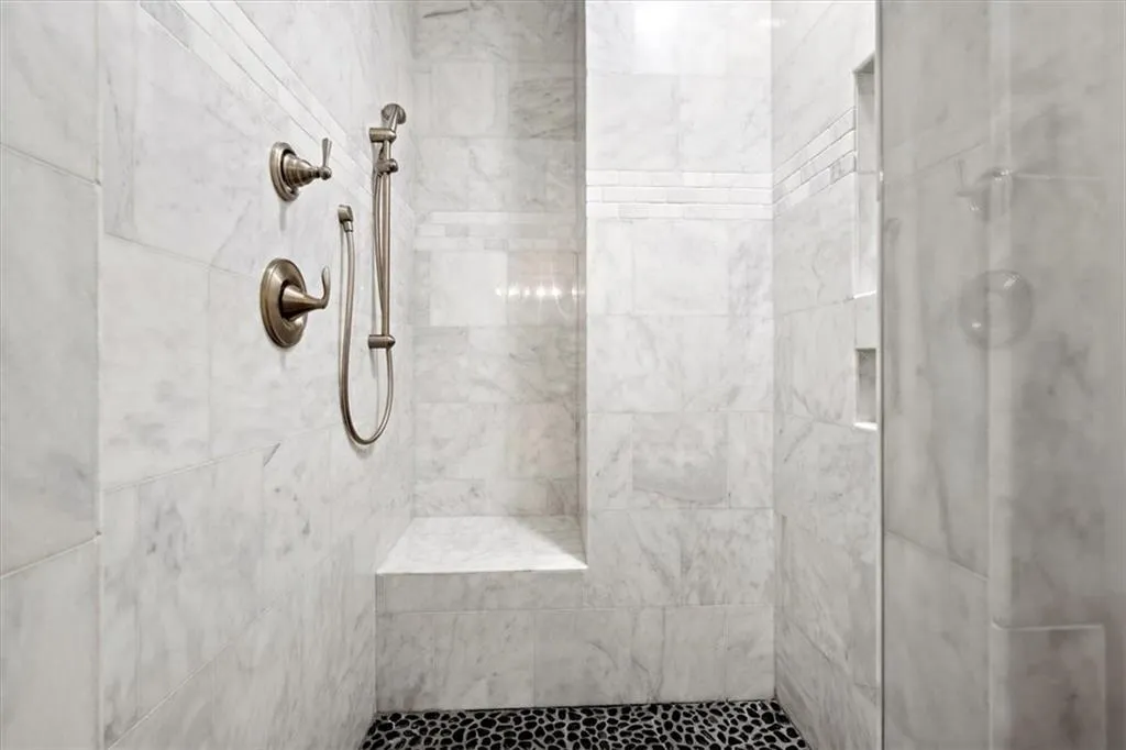 Bathroom with a tile shower Bathroom with a tile shower