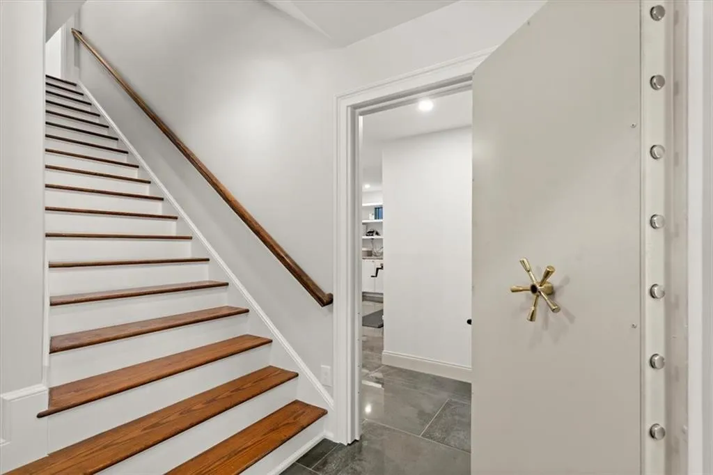 Staircase with dark tile floors Staircase with dark tile floors