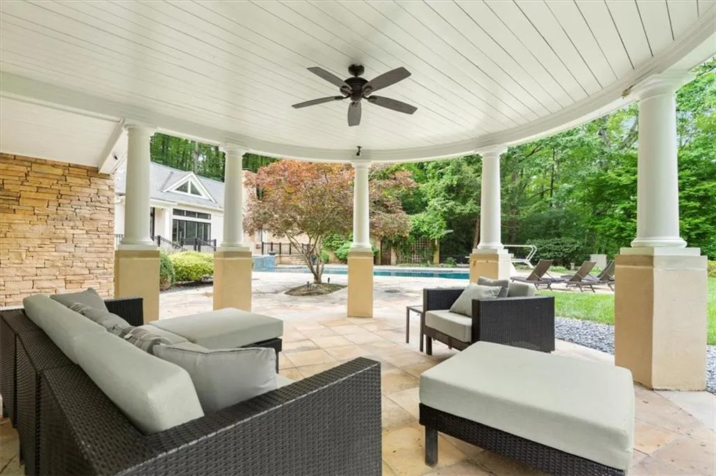 View of terrace with outdoor lounge area and ceiling fan View of terrace with outdoor lounge area and ceiling fan
