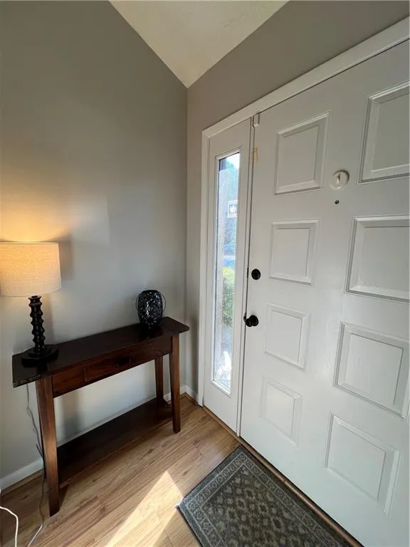 Entryway with light wood-type flooring