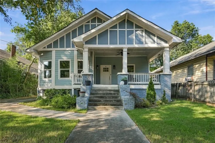 Craftsman-style exterior with a covered porch, durable siding, and a gabled roof