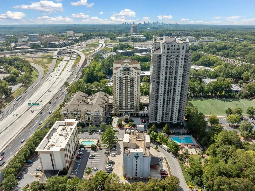 View of urban area featuring a major roadway and a pool area