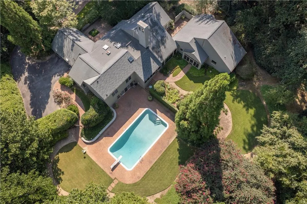 View from above of property featuring a pool