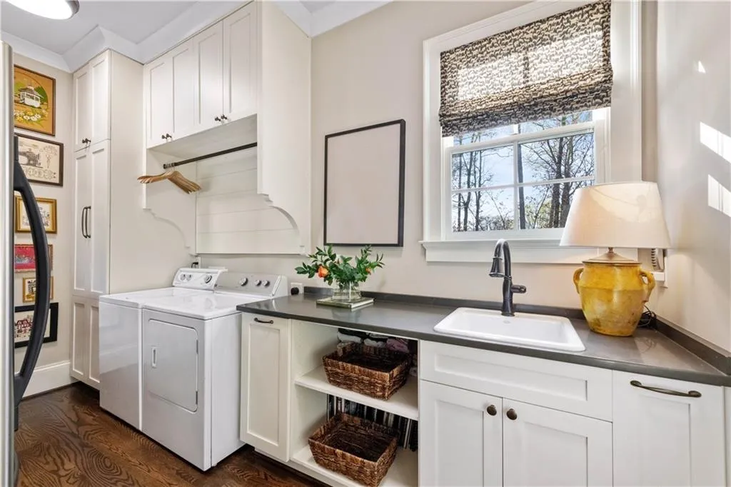 1st level laundry with storage and desk