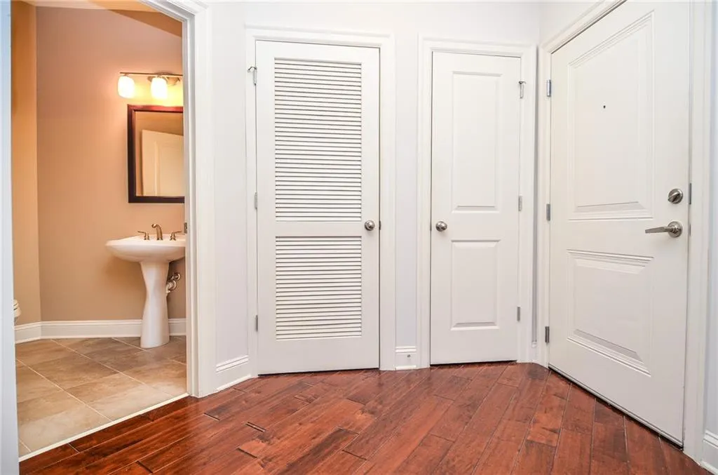 Hall featuring dark hardwood / wood-style floors