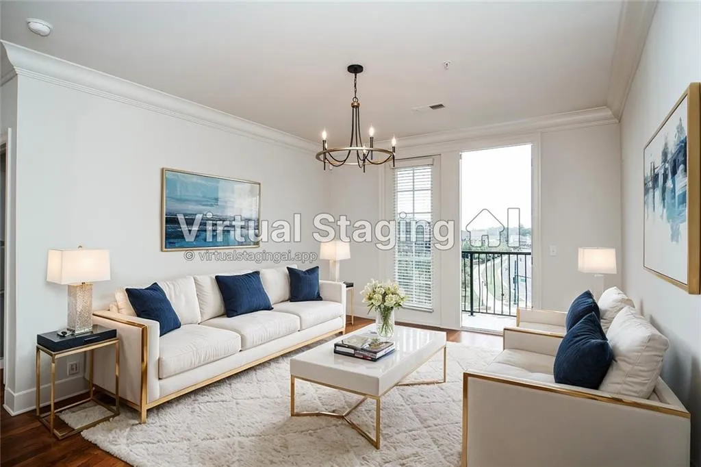 Living room featuring ornamental molding, a chandelier, and hardwood / wood-style flooring