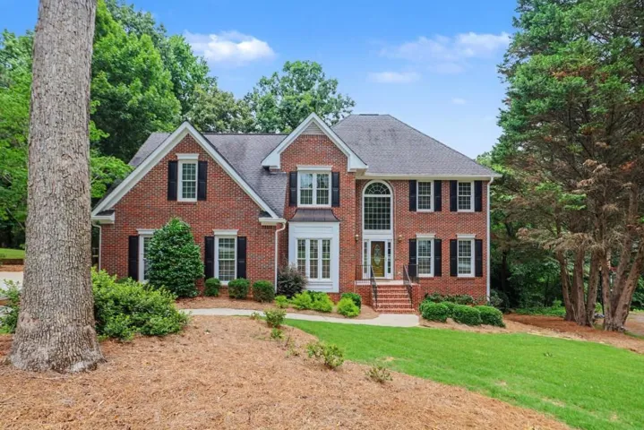 WELCOME HOME TO THIS IMPRESSIVE 7-BEDROOM, 4-BATHROOM BRICK BEAUTY OFFERING EXCEPTIONAL SPACE, TIMELESS ELEGANCE, AND INCREDIBLE FLEXIBILITY FOR TODAY'S LIFESTYLE. NESTLED ON A LEVEL HOMESITE, THIS METICULOUSLY MAINTAINED HOME FEATURES A FULL DAYLIGHT BAS