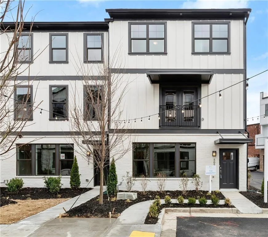 Modern farmhouse featuring brick siding