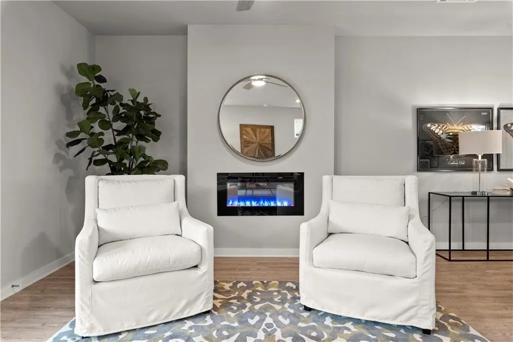 Living area featuring wood finished floors and baseboards
