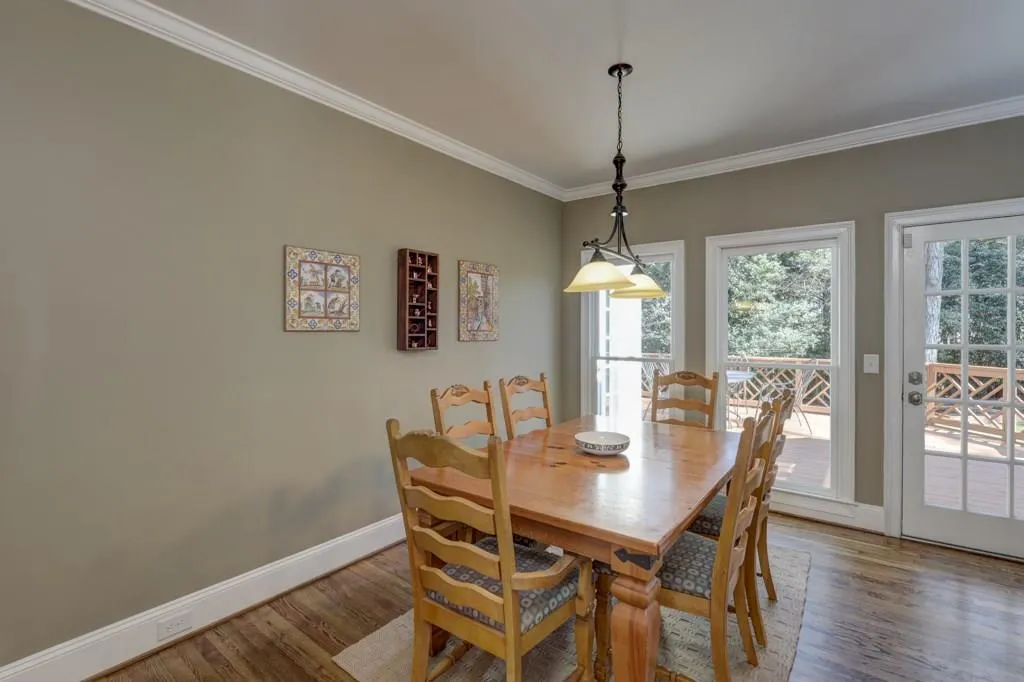 Breakfast Room Has Door the Leads to Deck