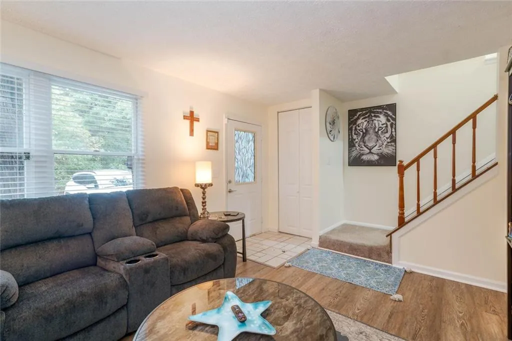 Living room featuring a and light hardwood / wood-style flooring