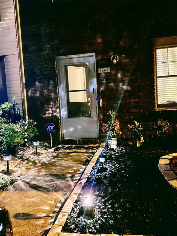 Picture at night of front of townhome