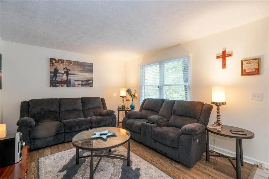 Living room featuring  hardwood / wood-style floors
