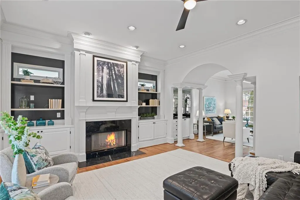 Fireplace with gas starter and custom built-ins