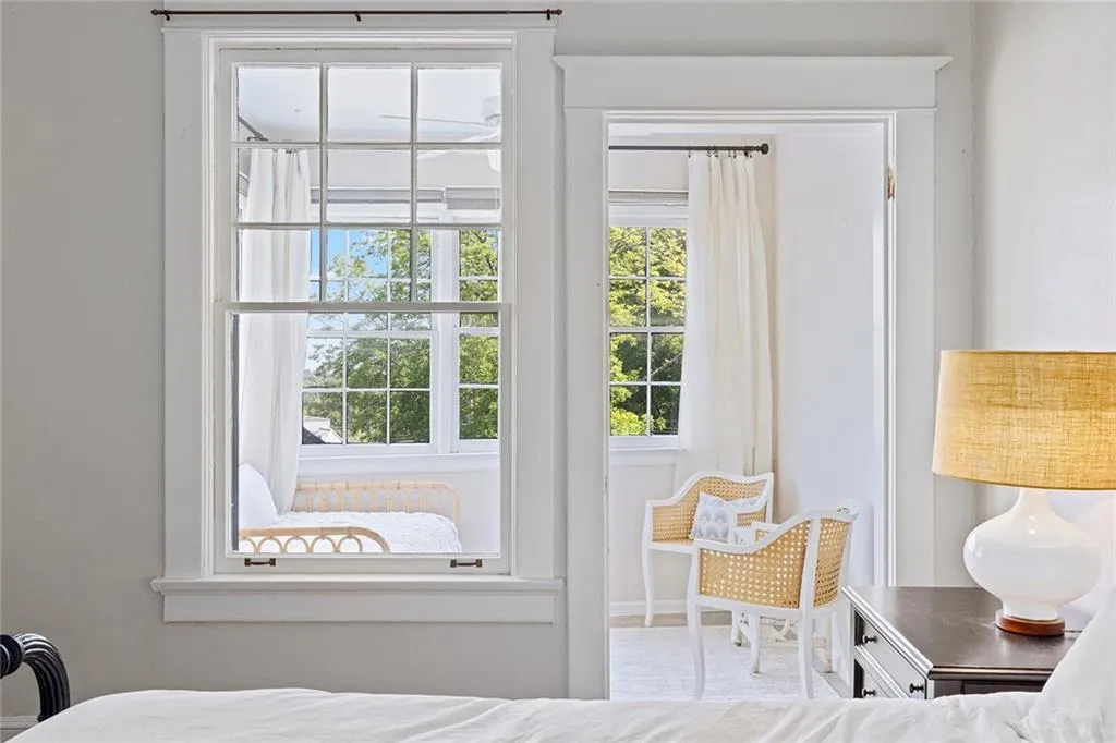 Secondary bedroom with private sunroom overlooking Botanical Gardens