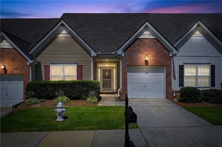 Brick and siding exterior with gabled roof lines