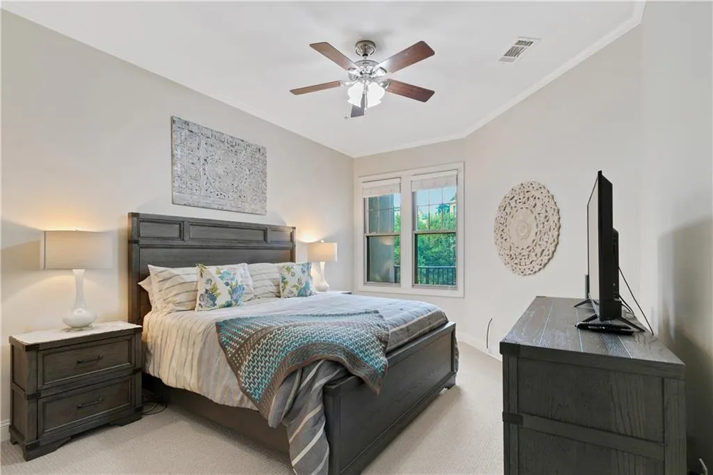 Bedroom with walk-in closet, flawless carpet