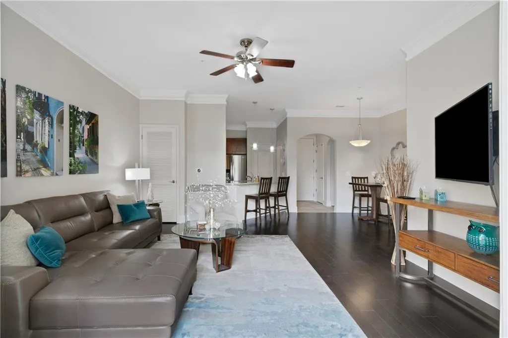 Kitchen open to living room with breakfast bar