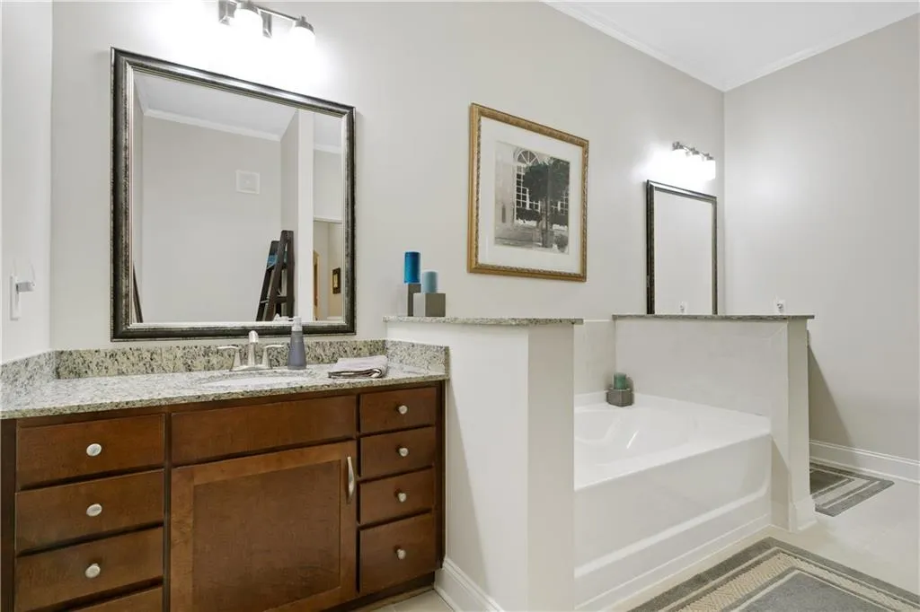 Oversized bath with glass shower and separate soaking tub - double vanities, linen closet