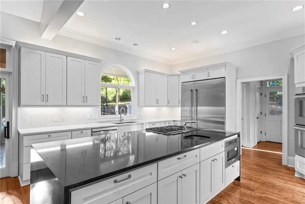 island microwave and prep sink in this huge island.