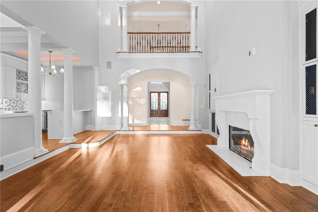 Looking through great room to entry foyer. Beverage bar to the left.