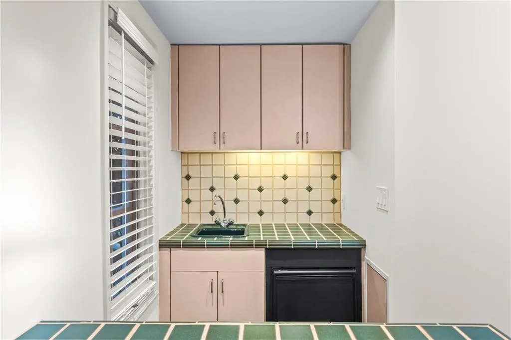 Second wet bar for convenience while enjoying this relaxed space.