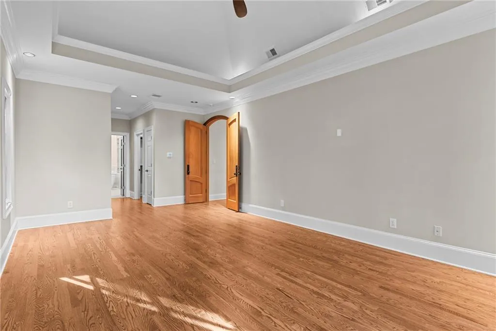 Beautiful entry door, tray ceiling and lots of windows for natural light!