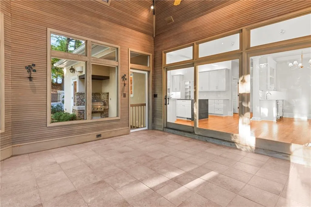 Located just off the kitchen, breakfast room and outdoor grill, this will become a favorite space!