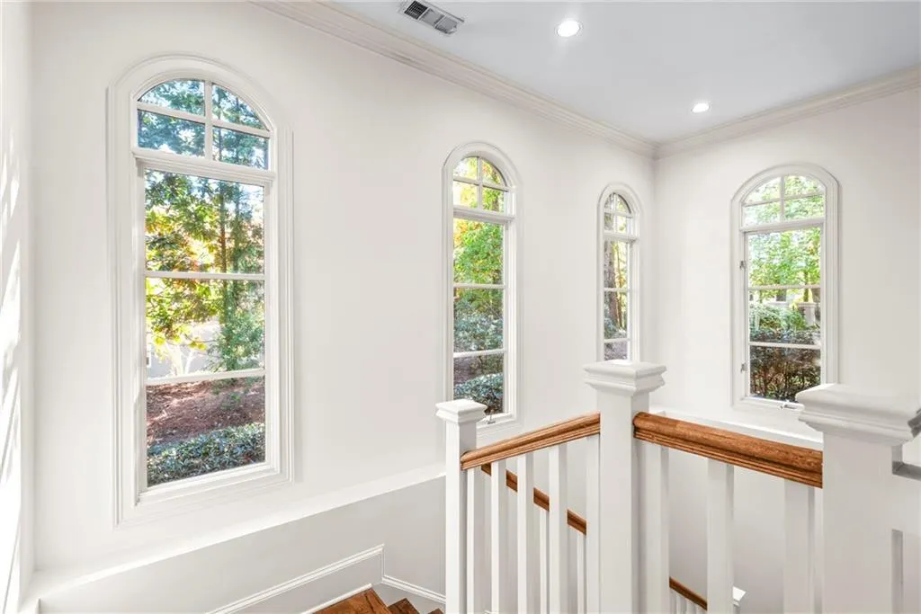 Light and bright staircase is the route to the daylight terrace level!