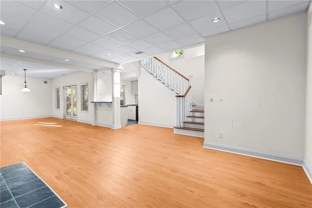 Another wet bar - and exterior exit to a patio and walk up to the pool