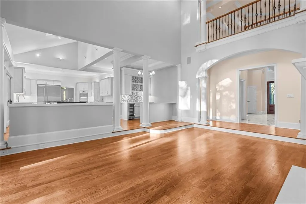 From the great room enjoy the view of the bar, breakfast room & kitchen!