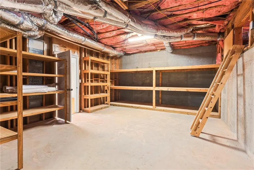 Unfinished portion has lots of shelving and mechanicals for easy access.